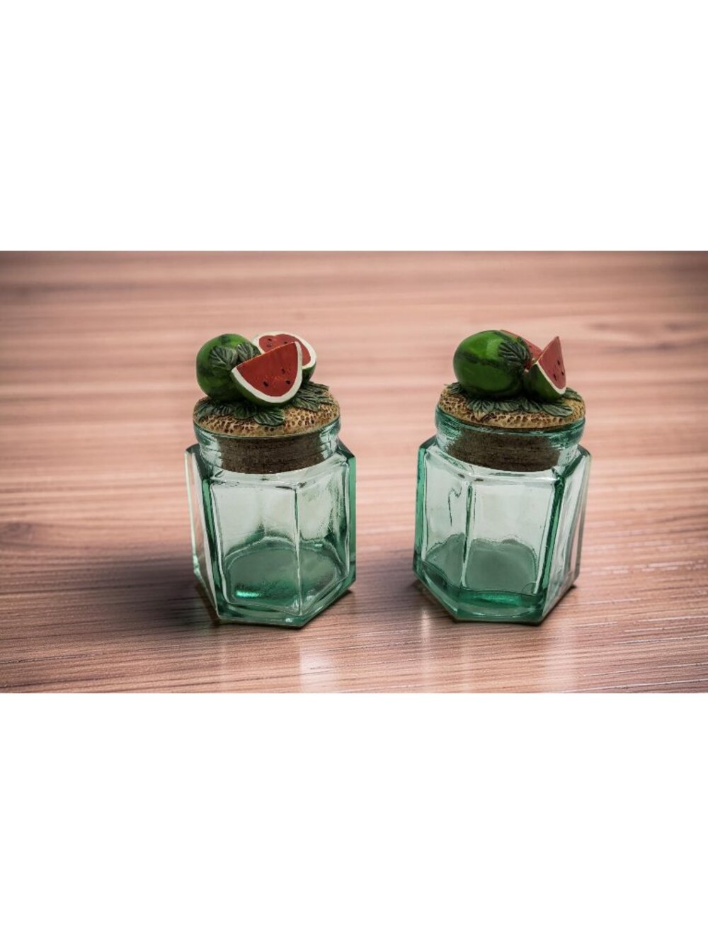vintage green paneled glass canister set with watermelon lids of resin and cork,
